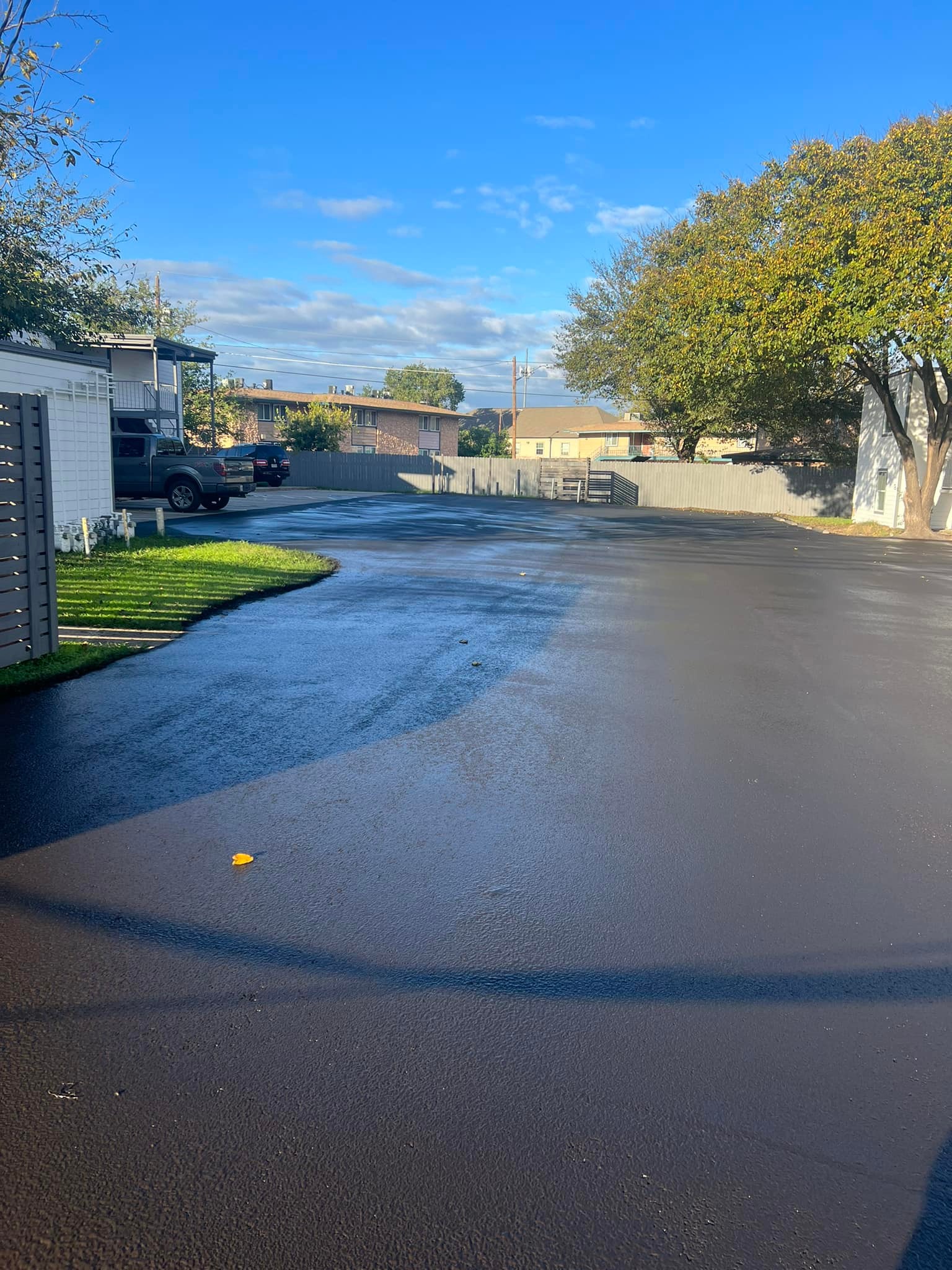 newly paved asphalt driveway